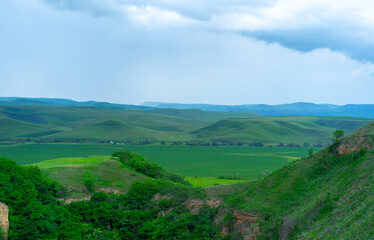 Fototapeta na wymiar Mountain valley stretching over the horizon
