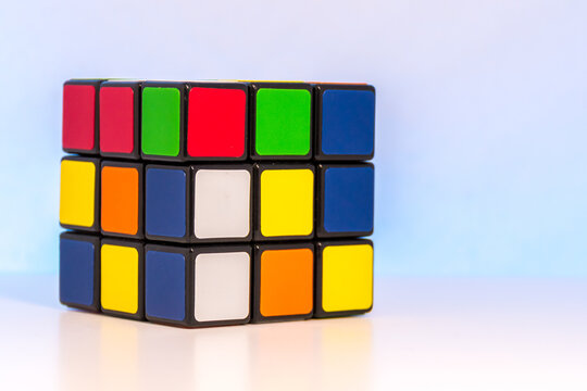 Shuffled Magic Cube for problem-solving on light blue background