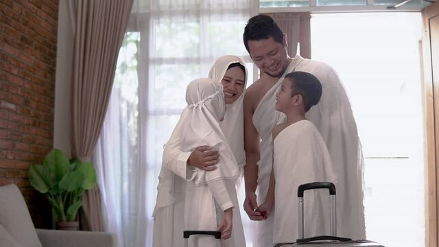 muslim umrah and hajj with family showing passport