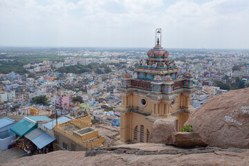 view from the top of the tower of the south indian temple malaikottai. the urban landsape of trichy city can be seen from here.