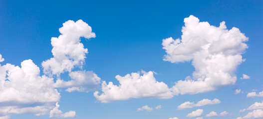 Obraz na płótnie Canvas White clouds on blue sky background.