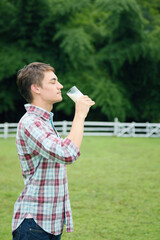 Man drinking a glass of milk