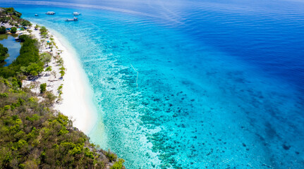 Beautiful view with an aerial top view as perspective of the Sumilon island beach landing near Oslob, Cebu, Philippines.