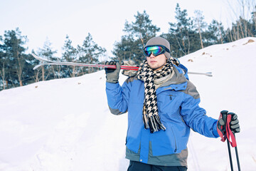 Man with ski equipment