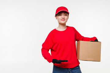 Delivery, relocation and unpacking. Smiling young woman holding cardboard box on white background