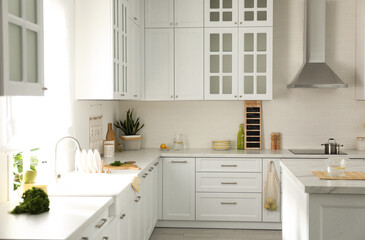 Fototapeta na wymiar Elegant kitchen interior design with modern furniture