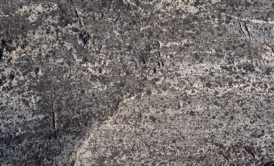 Abstract background, stone surface, texture of stone, moss, cracks, facets