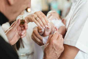 baptism ceremony in the church. priest performing a ritual