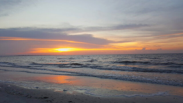 light orange sunset beautiful view panorama blue sea with gray cloud sky of tropical beach
