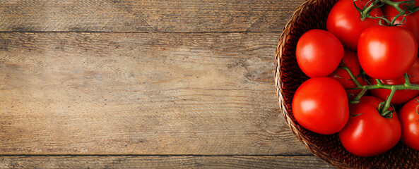 Top view of bowl with fresh tomatoes on wooden, space for text. Banner design