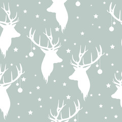 Christmas seamless pattern with deers, stars and Christmas balls.