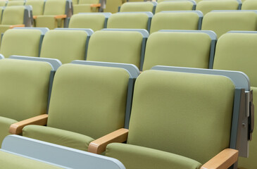Naklejka premium Lecture hall. Empty chairs.