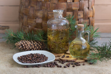 Bottle of aroma oil cedar and homemade tincture cedar.