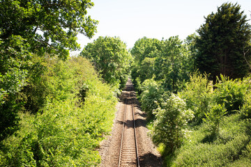 railway track cutting through the countryside