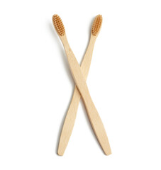 two wooden toothbrushes on a white background