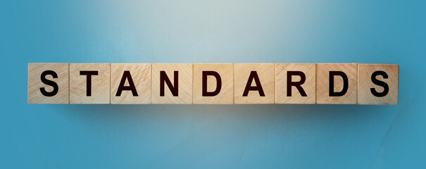 Standards Word Written on Wooden Cubes. Policies concept