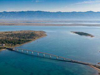 Obraz premium Aerial view of bridge to island Vir