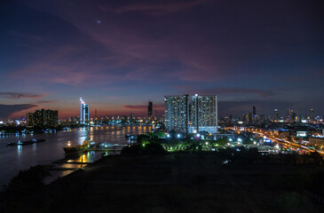 Fototapeta na wymiar Bangkok riverside skyline with Chao Phraya river, Thailand