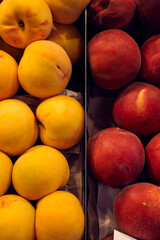 Various peaches at a neighborhood market
