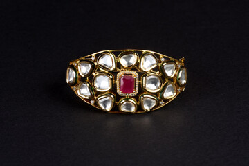 Gold bracelet on black background,kundan bracelet,Style, fashion and design of jewelry. indian traditional jewellery,Indian wedding jewellery