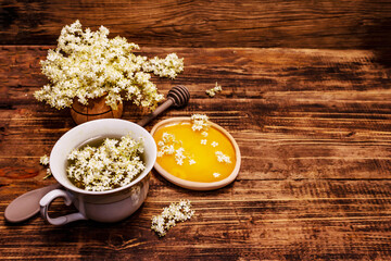 Tea from fresh elder flowers. Hot drink, honey, alternative medicine