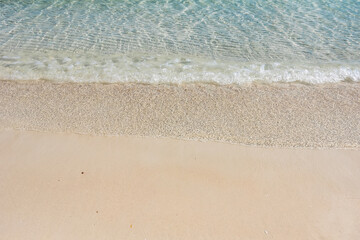 Fototapeta na wymiar Beach and sea background, Sand and bubble, wave. Soft wave on sandy beach. Background.