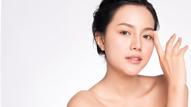 Close up Beautiful Young asian Woman touching her clean face with fresh Healthy Skin, on white background, Beauty Cosmetics and Facial treatment Concept