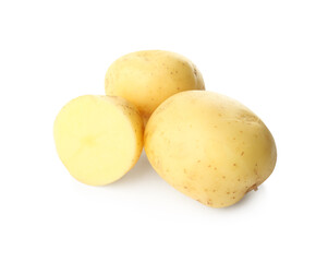 Whole and cut fresh raw organic potatoes on white background