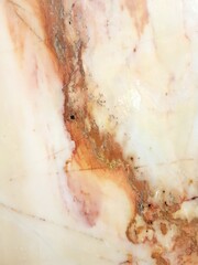 Fototapeta premium Pink textured marble background. Glossy surface, natural pattern. Natural material, rock.