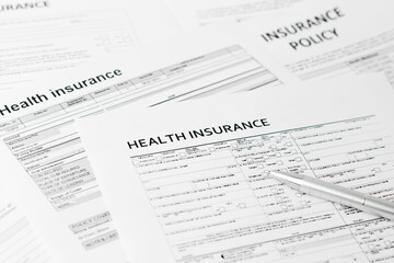 Obraz premium health insurance form, paperwork and questionnaire for insurance concepts