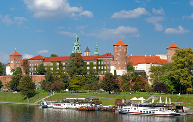 Naklejka premium Wawel Castle in the day viewed from across the River Vistula in Krakow, Poland