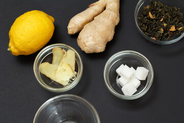 Health remedy foods for cold and flu relief on a black background.