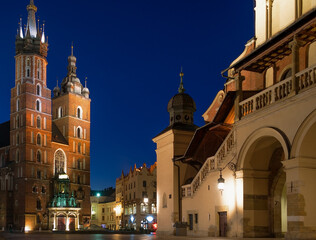 The Cloth Hall and the Basilica illuminated at night in Krakow, Poland	