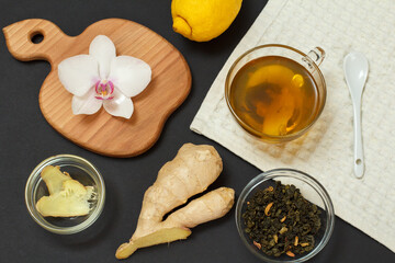 Health remedy foods for cold and flu relief on a black background.