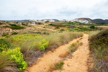 sandy path to tourist town Carrapateira, Portugal