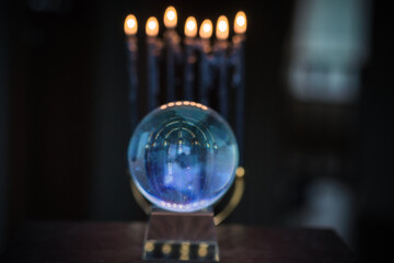 Magic crystal ball fortune teller ,love telling,  esoteric concept, mystical scene with candles,...