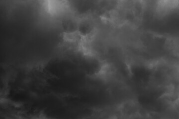 Naklejka na ściany i meble black and grey clouds before rainy