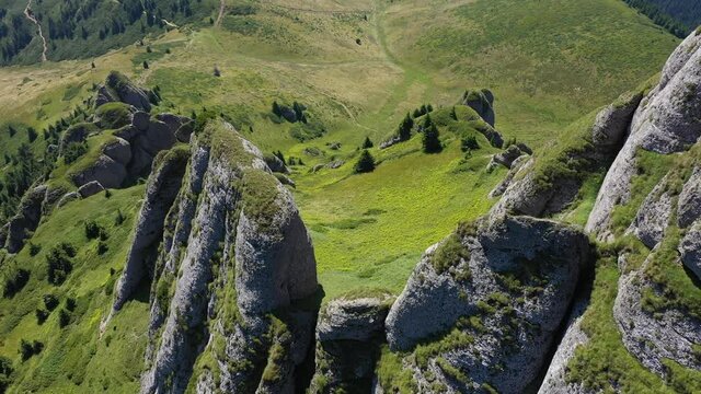  Flying above conglomerate cliffs in the Ciucas mountains, Carpathians, Romania