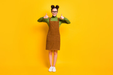 Fototapeta na wymiar Full length photo positive cheerful girl enjoy excellent ads promo recommend choose decide show thumb up sign wear green sweater skirt overall isolated bright shine color background