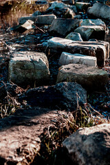Old stone path, stony road, vertical background