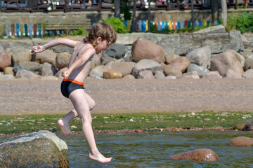 A little boy on the beach © hoha_old