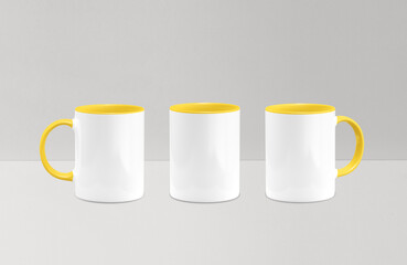 White inside yellow mug mockup isolated on grey background