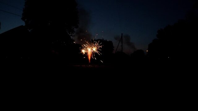 Fountain fireworks being shot off on the streets of Nebraska