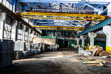 Old abandoned industrial factory warehouse at sunny day