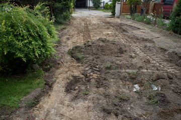 excavate in the yard in front of the house in the countryside