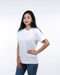 Front view white t-shirt Closeup on female body, woman girl in empty white t-shirt isolated on white background. Design woman t-shirt template and mockup for print.