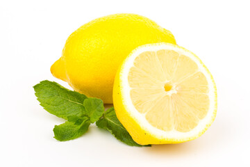 Group of lemons with mint leaves, isolated on white background