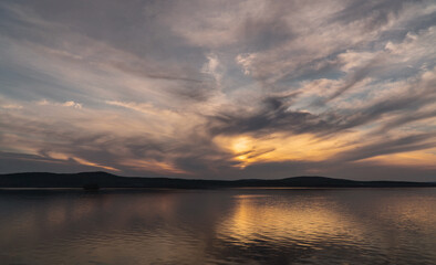 beautiful clouds during sunset over the lake