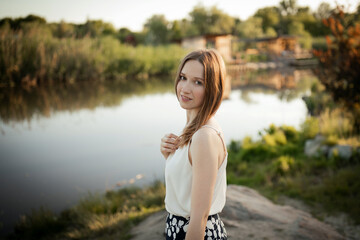 Beautiful girl outside. In the park. On nature