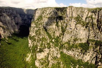 Panoramic view of the Vikos gorge from the viewpoint Oxya of Monodendri village, one of the 45 villages known as Zagoria or Zagorochoria in Epirus region of southwestern Greece.